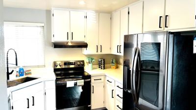 1 Bed / 1 Bath condo; garage, pool / private patio 6