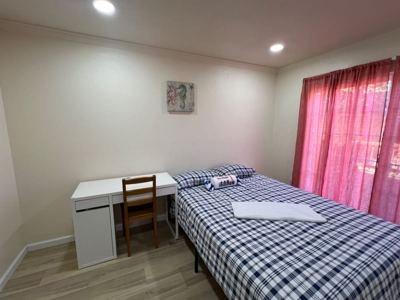 Cheerful bedroom in a remodeled house 1