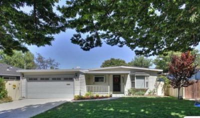 Cozy house nested around trees B 3