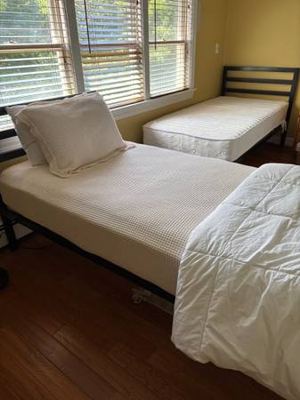 2 twin bed frames, mattresses and bedding 3