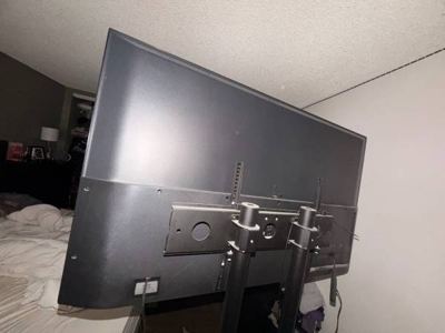 Heavy-Duty Rolling TV Stand / Mobile TV Cart – Large TVs 8