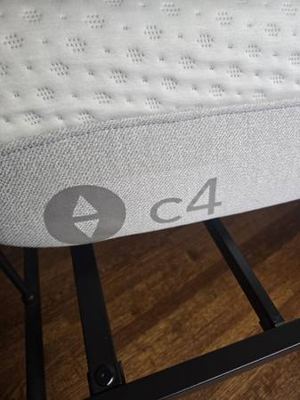 Sleep Number C4 full size mattress and black frame. 2
