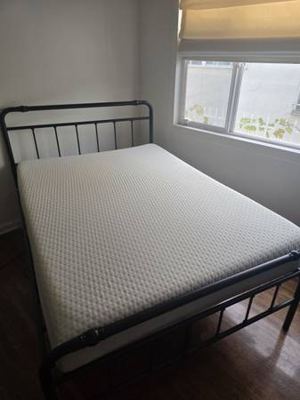 Sleep Number C4 full size mattress and black frame. 1