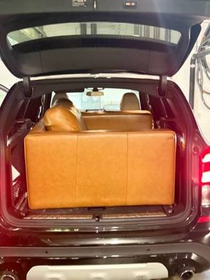 Single brown leather couch and and coffee table set 3