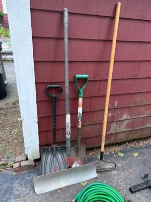 Log rack, yard tools, wine rack, galvanized bins, new hose, TV stand 1