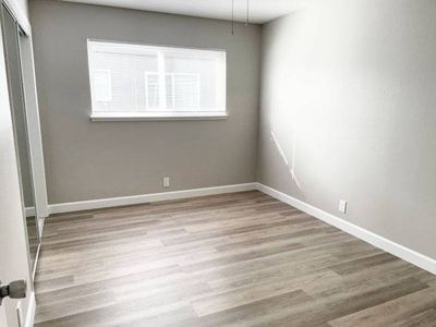 Wood-style flooring throughout, Dual pane windows, 2BD 1BA 2
